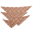 Three triangular bandanas with a pattern on a white background